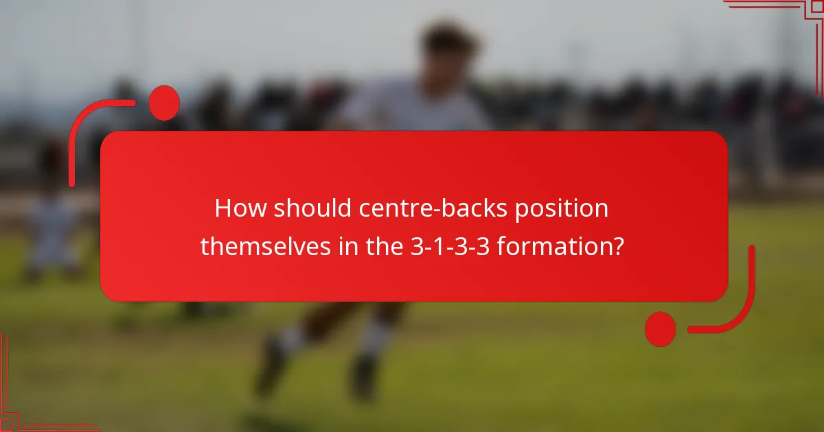 How should centre-backs position themselves in the 3-1-3-3 formation?